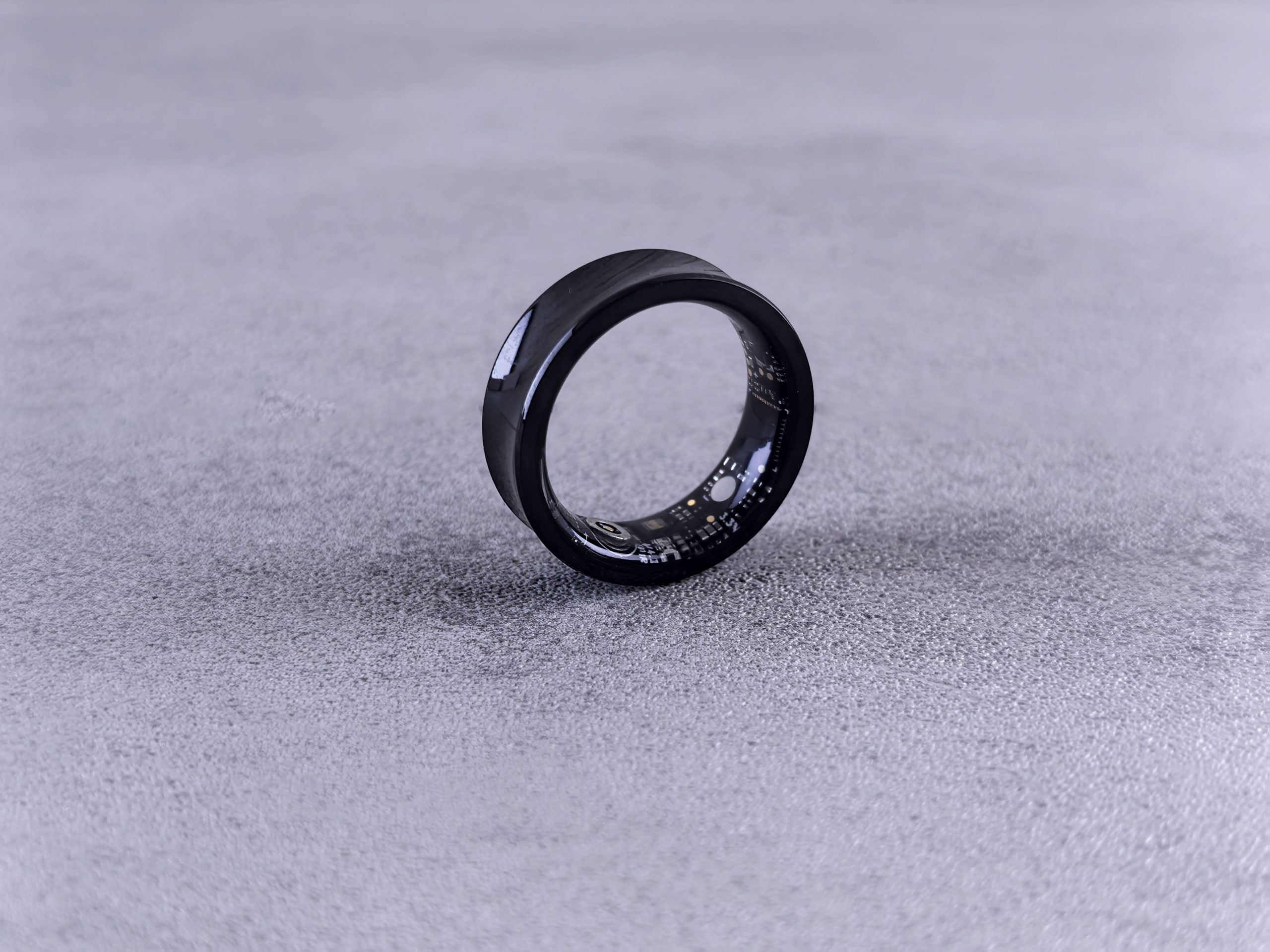 Modern black smart ring used for HRV and sleep tracking